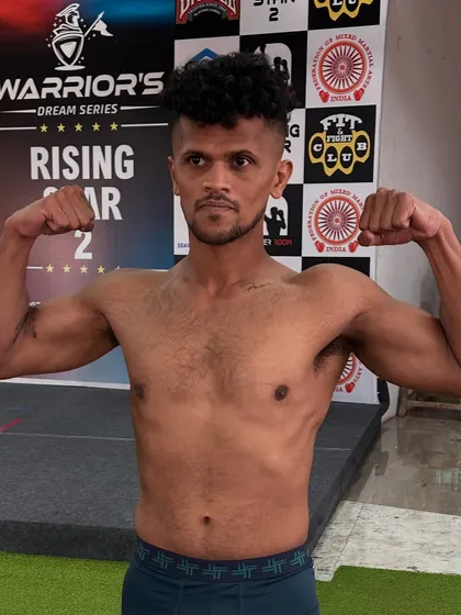 A fighter ready for war. Here is one of our athletes at the official weigh-in for the Warrior's Dream Series, looking strong and prepared to compete.