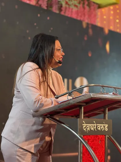 Speaking at an event. I believe in sharing my knowledge and empowering others, especially women, to build their own careers.