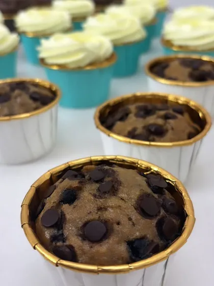 A detailed shot of my chocolate chip muffins before frosting. They are delicious on their own or can be topped with cream for an extra treat.