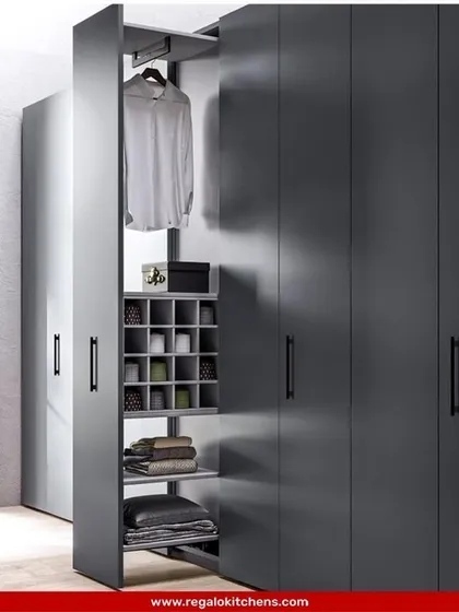 A clever pull-out unit that makes use of narrow vertical space. It includes a clothing hanger, shelving, and compartmentalized storage, perfect for maximizing every inch of your closet.