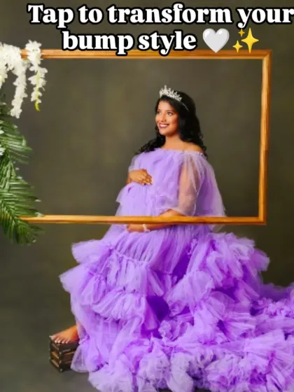 Frame your moment perfectly. Our lavender gown is styled here with a floral frame prop, adding an artistic and whimsical touch to your maternity photos.