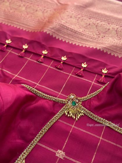 The back of a magenta blouse, showing the unique neckline and tassels. While the body may be silk, the velvet sleeves in other designs show my love for the fabric.