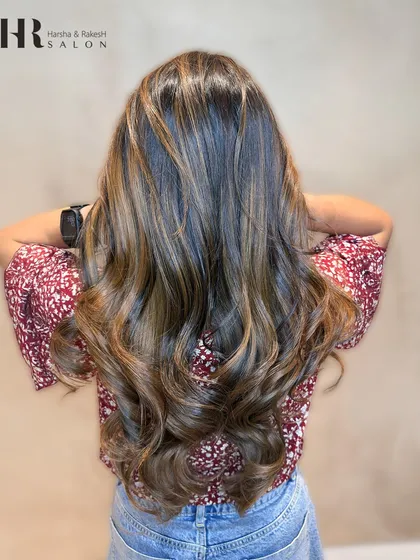 A full view of the beautiful, flowing waves and dimensional color. This is a timeless balayage look.