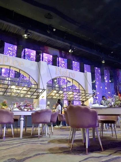 A view of our "Spice Bistro" concept, where guests can enjoy a sophisticated sit-down meal amidst the larger celebration. It's about offering variety in experience.