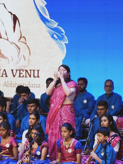 A student performing a conch invocation at the 'SUVARNA VENU' event. It was a beautiful moment showing the continuation of our musical lineage through the next generation.