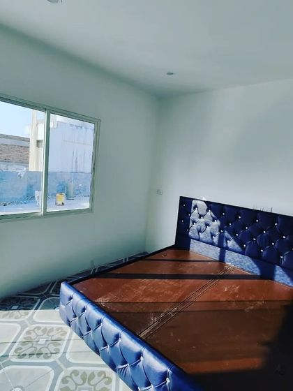 Our prefab rooms are not just empty shells. We deliver fully finished interiors, ready for furniture. This room includes finished walls, flooring, and a large sliding window.