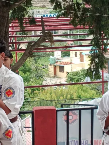 The focus is intense during the kihon practice. These students are demonstrating their ready stance, prepared for the next command during their grading.