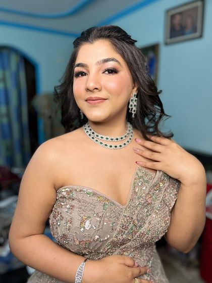 From our client diaries. A young woman looking gorgeous for her event in one of our rental gowns, complete with matching jewelry.