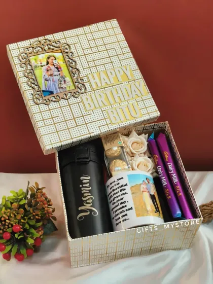 A customized birthday hamper for your love on her birthday. This one includes a personalized temperature-display bottle and a custom photo mug.
