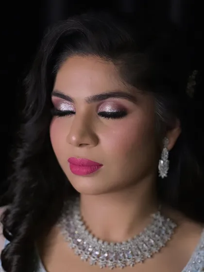 A close up of this stunning engagement bride's makeup. The shimmery eyes and pink lips are a perfect combination.
