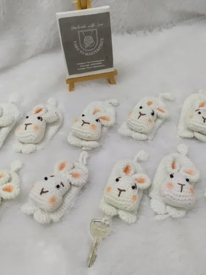 These clever bunny key holders have a retractable key ring. Pull the key, and the bunny's body extends from its cozy pouch.