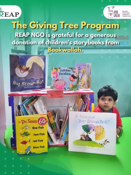 A child at the REAP Center poses with the new books from our Magic Crate Library. We are grateful for partnerships that help us plant the seeds of imagination and a love for reading.