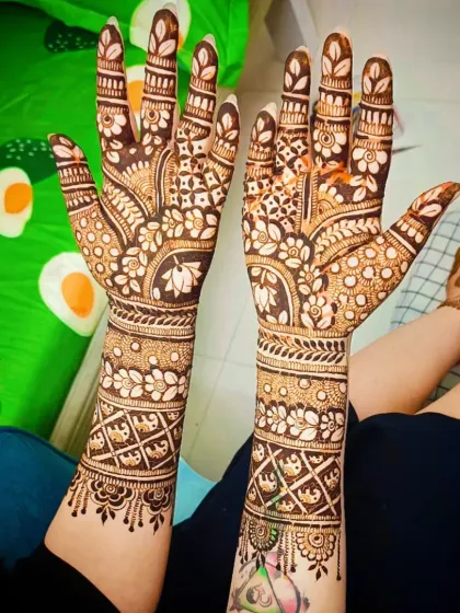 A full view of the design, capturing the elegant flow from the fingers to the forearm.