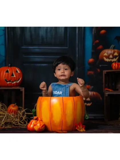 This little pumpkin is ready for trick-or-treating.