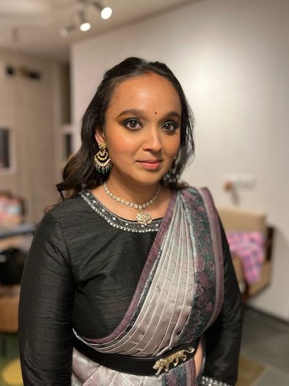 This client wanted a dramatic eye for her party. The intense smokey eye is balanced by glowing skin and a softer lip, making her eyes the main focus.