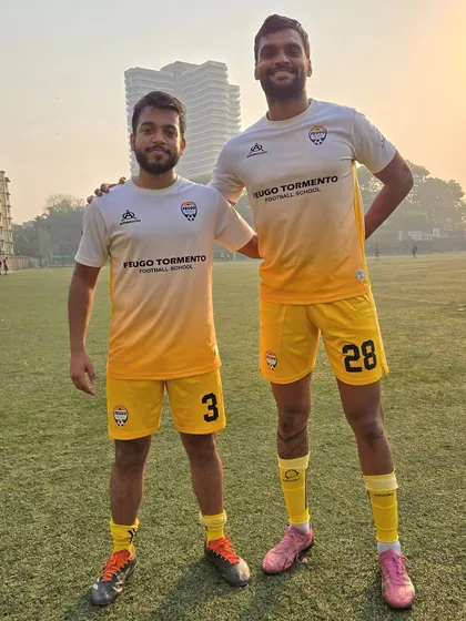 Two of our players from the senior team, representing the strong bonds formed within the academy.