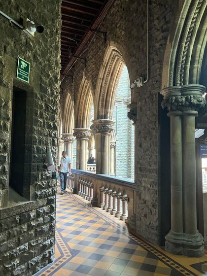The beautiful and imposing architecture of a court corridor. These halls have witnessed countless legal battles and journeys for justice.