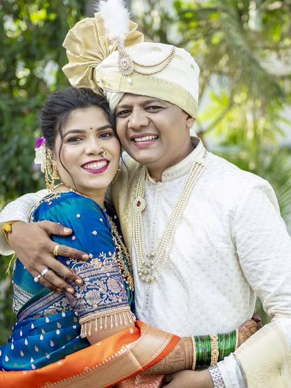 A joyful, hugging portrait that perfectly captures the happiness of the wedding day.