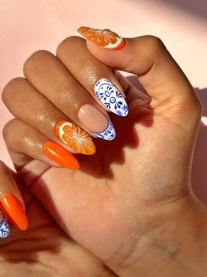 Bring me your inspiration and I'll make it happen. This set was inspired by Mediterranean tile art, featuring hand-painted blue and white patterns paired with juicy, 3D sculpted orange slices for a perfect summer vibe.