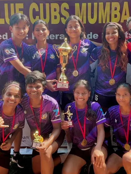 Our open women's team celebrating their championship win at the Blue Cubs tournament.