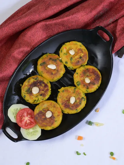 Veggies take center stage in this delicious Badami Tikki. Packed with nutritious vegetables and topped with crunchy almonds, it's a delectable and healthy snack.