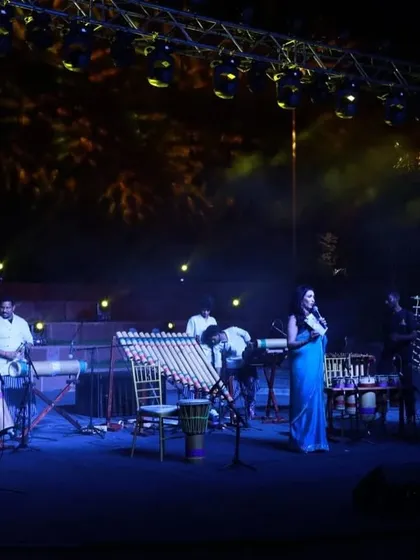 Interacting with performers on stage during a G20 cultural evening. As an emcee, my role is to bridge the gap between the artists and the audience, providing context and enhancing their appreciation of the performance.