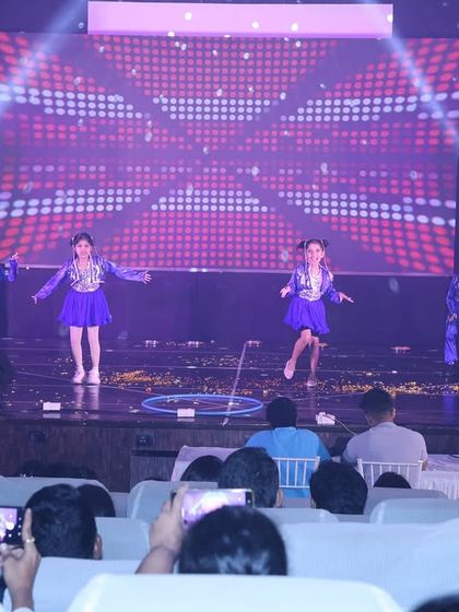 The "Rocky Rani" kids' performance in full swing, with the audience enjoying every moment of their adorable act.