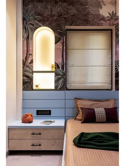 Another detail of the arched niche, which adds architectural interest and a soft, warm glow to the bedside area.