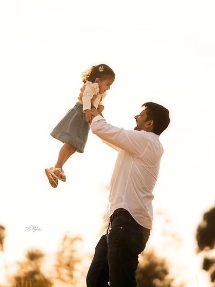 The pure happiness of a father lifting his daughter up against the setting sun. These are the precious, fleeting moments I help you preserve.
