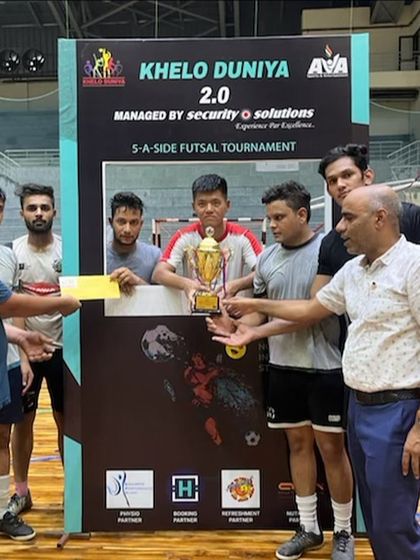 The runner-up team receives their prize at the Kheloduniya Futsal Cup. We ensure that all participating teams are recognized for their efforts in a professional ceremony.