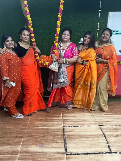 Posing by the traditional Teej swing. We make sure to celebrate every festival with authentic touches and lots of fun.