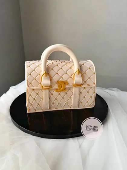 For the fashion lover, I sculpted this incredibly detailed and realistic handbag cake. Every element, from the quilted texture to the gold hardware, is handcrafted from fondant to create a stylish and delicious statement piece.