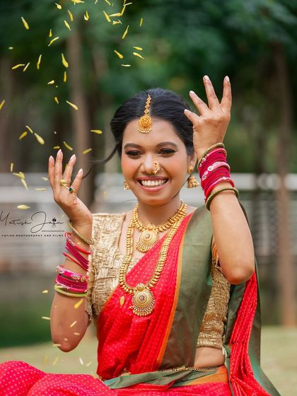 A joyful, candid moment from a festive shoot. The makeup is designed to be water-resistant and durable, staying perfect even during celebrations.