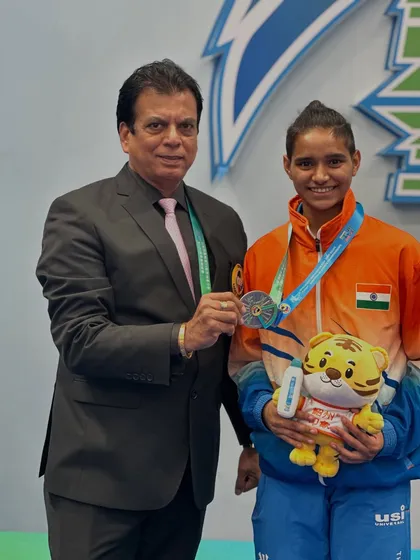 A close-up shot with Asian Championship silver medalist Ms. Rusha Tambat. Her hard work and our support system have yielded great results for the country.