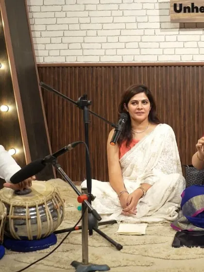 Sharing a smile with fellow artists during the 'Shaam E Sukhan' performance.
