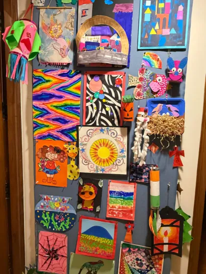 I just love it when my students are so proud of their work that they create a gallery wall at home. It's wonderful to see art become part of their lives.