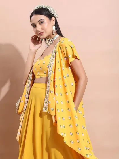 A duplicate of the full-length yellow outfit, emphasizing its flowing silhouette and vibrant color.