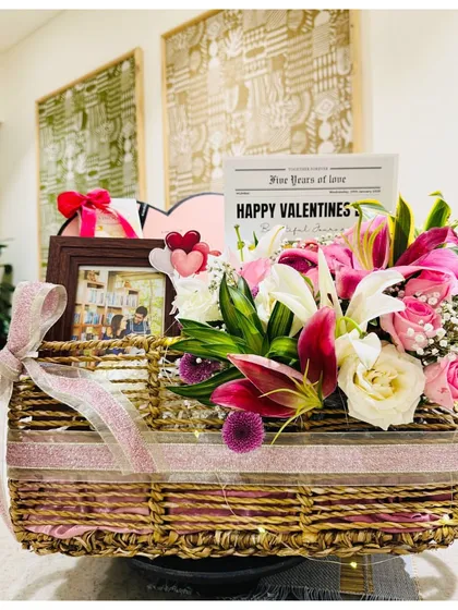 Another view of the stunning floral and gift arrangement, perfect for pampering her on the day of love.