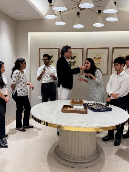 Sharing a piece of birthday cake with Riya. Small gestures of appreciation are important for morale and team spirit.