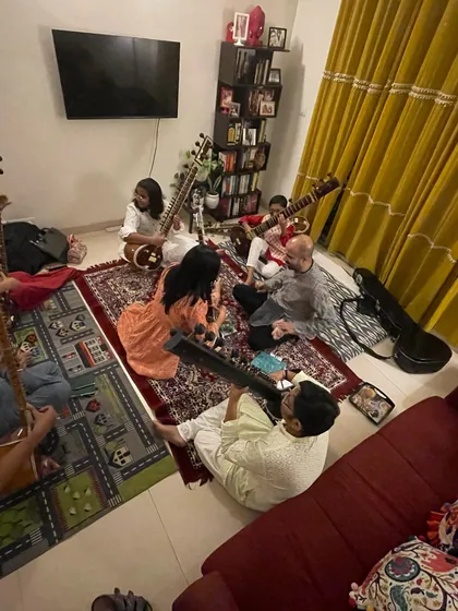 Another angle from our special Bijoya gathering. The informal setting of a home allows for a relaxed and comfortable learning environment, which is very important in the Guru-Shishya tradition.