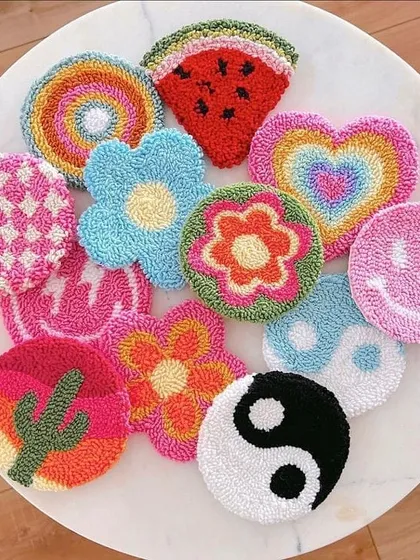 Just look at this vibrant collection of punch needle coasters made by beginners in my workshops. You can create your own unique designs, from colorful rainbows and flowers to trendy yin-yang symbols, all in one session.