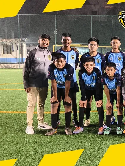 The winning squad posing with their coach. This photo captures the unity and dedication that defines our teams.