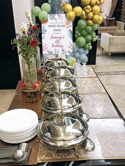 A birthday party is always a special occasion. Here is a compact buffet setup for a 6th birthday, complete with themed decor, ensuring the food presentation was as fun as the party itself.