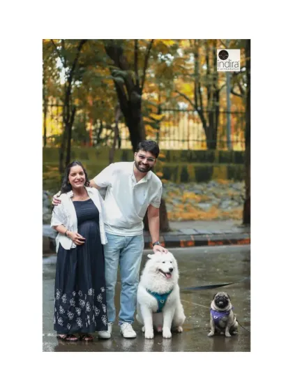 A perfect family portrait doesn't have to be formal. Here, we captured a beautiful outdoor maternity moment with the happy couple and their two very special furry family members. It’s all about capturing your family, exactly as it is, full of love.