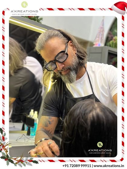 Style Director Derick Francis consults with a client, ensuring every detail is perfect. This personalized attention is a hallmark of our service.