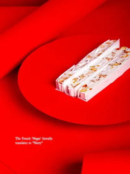 The French word 'Nougat' literally translates to 'Nutty,' a fitting name for this treat packed with nuts.