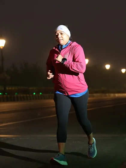 Staying warm and keeping the pace on a chilly Delhi morning.