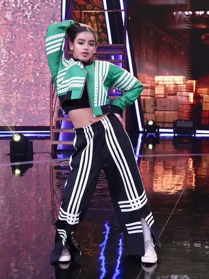 Capturing that main character energy on the Hip Hop India stage. This photo shows the confidence and stage presence I bring to live performances, connecting with the audience through powerful poses and expressions.