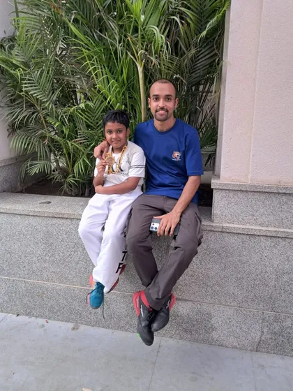A moment with a young student after his win. These are the moments that make all the hard training sessions worthwhile.