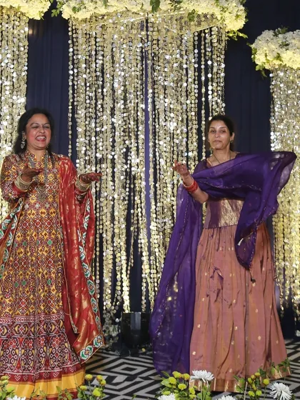 Two lovely ladies from the family enjoying their performance at the mehendi. Their colorful outfits looked amazing.